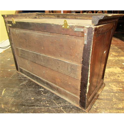 2143 - An 18th century food cupboard enclosed by two panelled doors with mesh grills, original steel lock, ... 