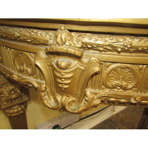 2145 - A mid 19th century console table, the base with repeating geometric detail, to the centre a scallop ... 