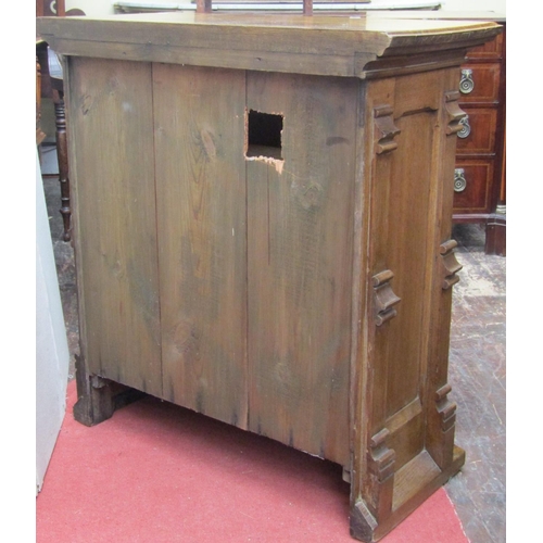 2150 - A Victorian oak cabinet with Gothic tracery detail, enclosed by a single door with further applied m... 