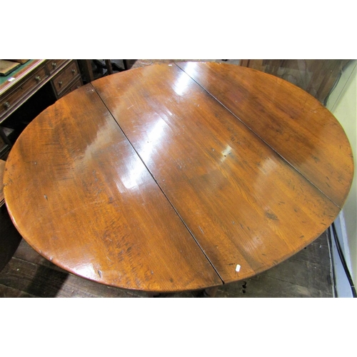 2154 - A good quality oak gateleg table with double gate action, raised on turned supports, together with e... 