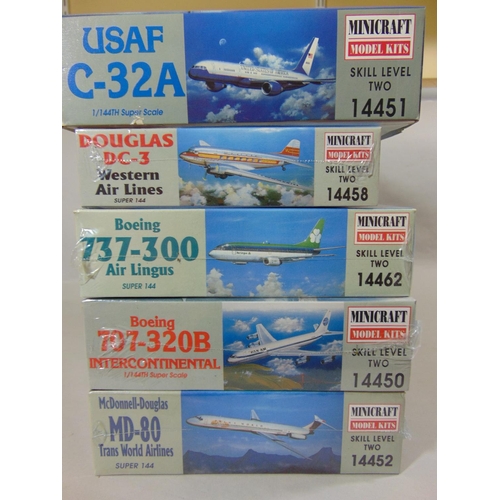 676 - A collection of 10 model aircraft kits, all 1:144 scale transport aircraft, including 4 by Revell, 5... 