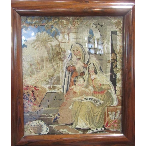 517 - Two religious wool work tapestry pictures in good rosewood frames, 37 x 31cm and 37 x 28cm respectiv... 