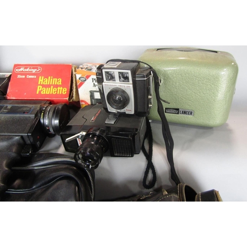 520 - A collection of vintage photography equipment to include a Koma-Lux camera, a further Kodak EK 100 i... 