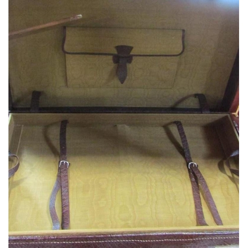 523 - Good large vintage hide travelling trunk, the hinged lid enclosing a trayed tier and fitted interior... 