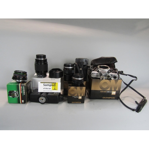 527 - A mixed lot comprising a selection of vintage camera equipment and a collection of silver plated fla... 