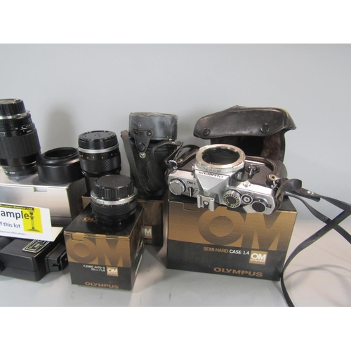 527 - A mixed lot comprising a selection of vintage camera equipment and a collection of silver plated fla... 