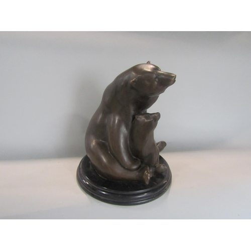 530 - Cast bronze figural study of a polar bear and cub, upon a stepped circular black marble base, Paris ... 