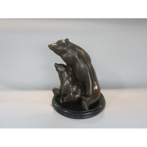 530 - Cast bronze figural study of a polar bear and cub, upon a stepped circular black marble base, Paris ... 