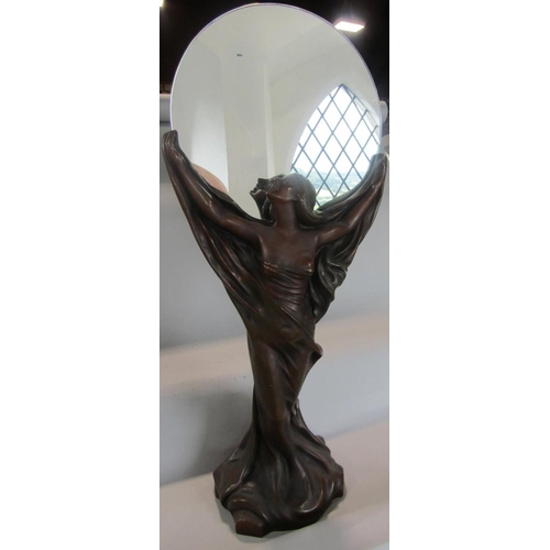 535 - Art Nouveau style figural mirror, the circular plate held aloft by a semi nude maiden, 87 cm high