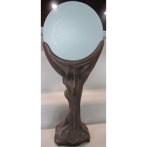 535 - Art Nouveau style figural mirror, the circular plate held aloft by a semi nude maiden, 87 cm high