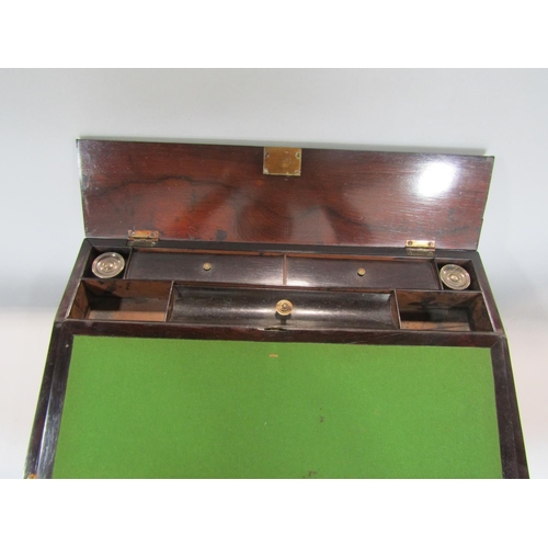 552 - 19th century rosewood campaign style writing slope, the hinged top with typical recessed brass handl... 