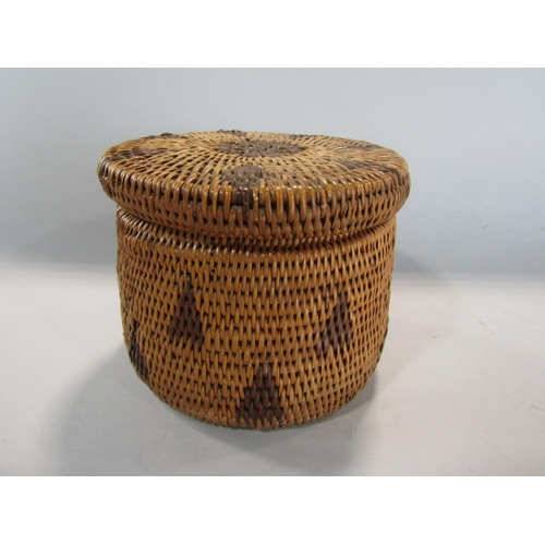 567 - Interesting native American wickerwork lidded casket of circular form, 10cm high x 13cm diameter