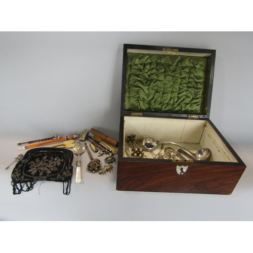 572 - A walnut casket containing a collection of interesting items to include silver plated flatware, a Vi... 