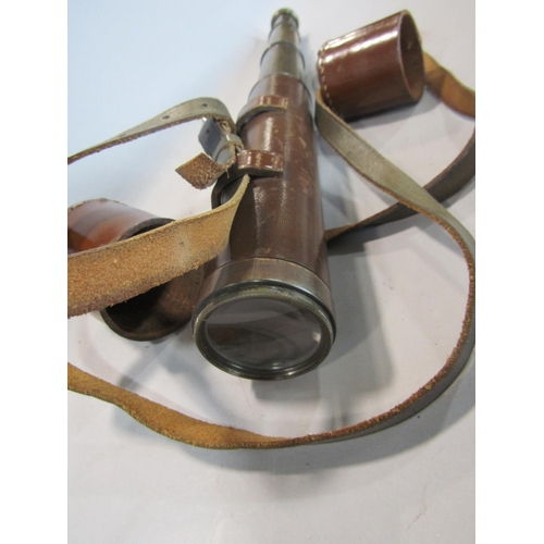 578 - Nelson 20x B.C. & Co Ltd leather clad brass draw telescope