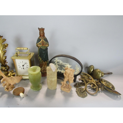 586 - A mixed miscellaneous lot comprising a brass cased carriage clock, a collection of brass door and ca... 