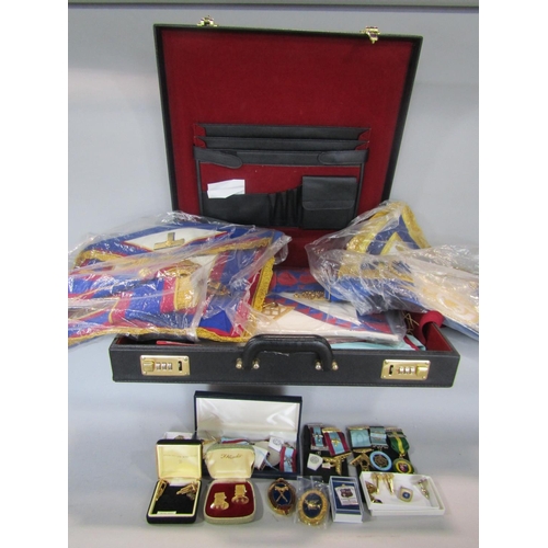 595 - A leather briefcase containing a large collection of Masonic regalia for mainly the Gloucestershire ... 