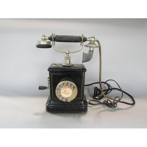 602 - Vintage Kirstin Kirks telephone, with windup handle and japanned steel frame, 32cm high