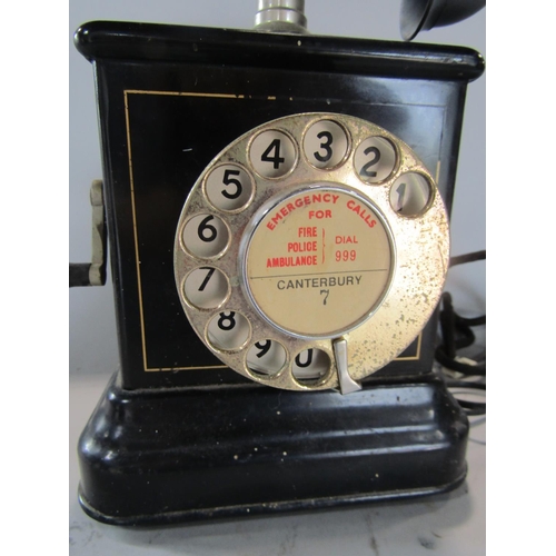 602 - Vintage Kirstin Kirks telephone, with windup handle and japanned steel frame, 32cm high