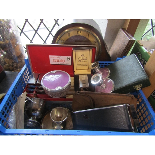 609 - A mixed lot comprising a three train mantel clock, a collection of silver plate and enamel dressing ... 