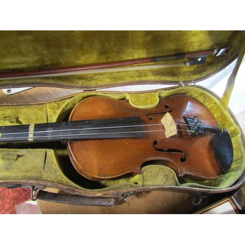 616 - Three quarter length violin within a wooden hard case