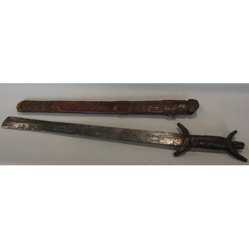 623 - Ethnic sword, the steel blade with etched detail, with leather sheath, 61cm long