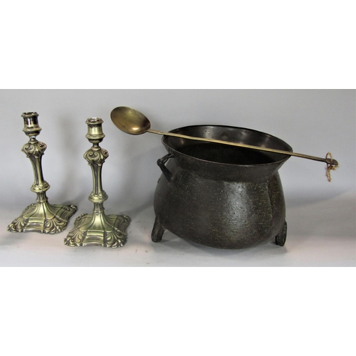 634 - A good quality antique bronze cauldron with twin handles and three feet, 23cm x 34cm diameter; toget... 