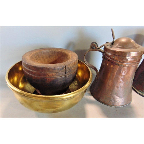 587 - Two old English copper vessels, one with hinged cover, circular cast brass bowl and treen mortar