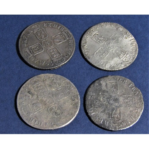 457 - Four William III silver shillings, 1696 and 1697 (the other two examples date worn)