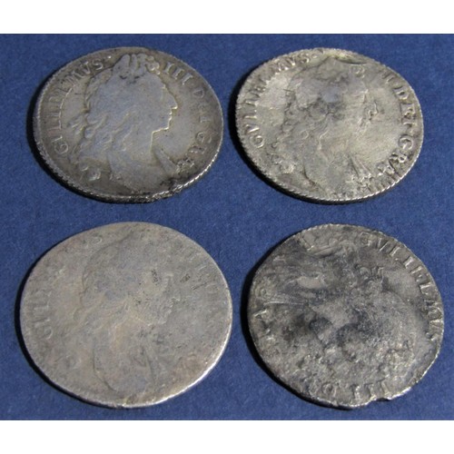 457 - Four William III silver shillings, 1696 and 1697 (the other two examples date worn)