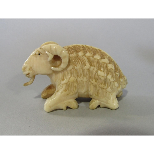 476 - A collection of late 19th century ivory carvings wolf, two rats on a coil, crab, mountain goat chara... 