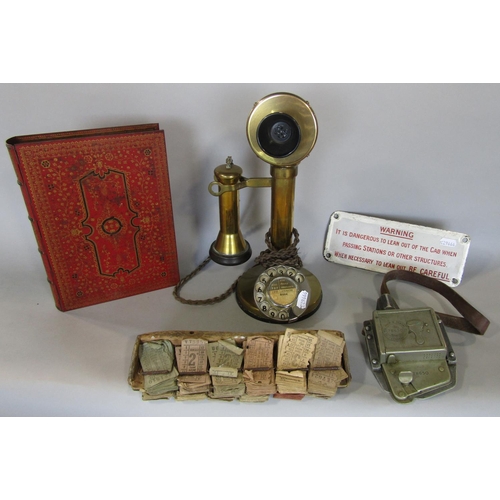 617 - A vintage brass candlestick telephone together with a a further vintage ticket punching machine and ... 