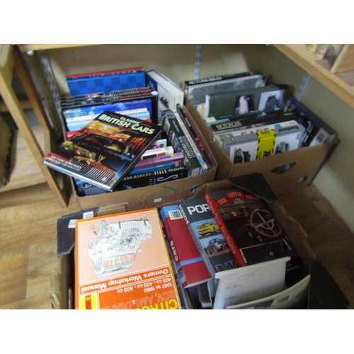 950 - Three boxes containing predominantly non-fiction automobile books (around 70)