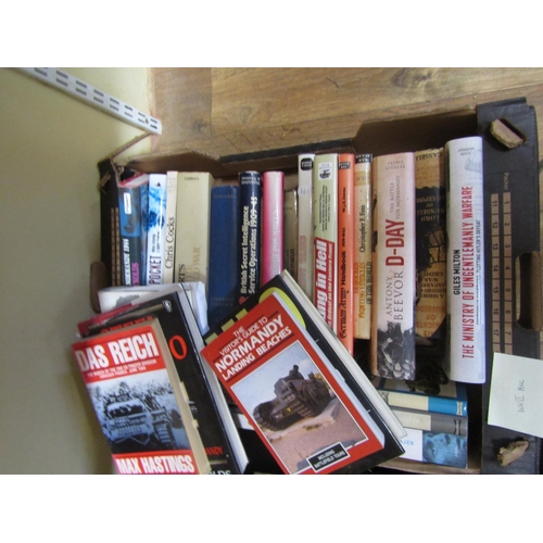 951 - Two boxes of military books, the lion's share of which relate to the Second World War (2)