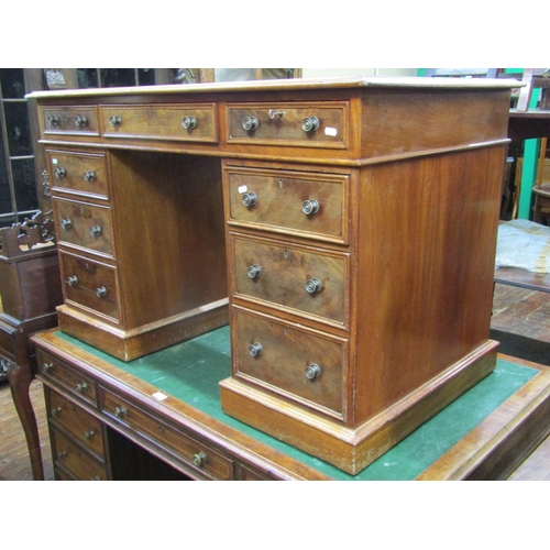 2164 - A mid 19th century mahogany pedestal writing desk with flamed veneers, nine graduated drawers set up... 