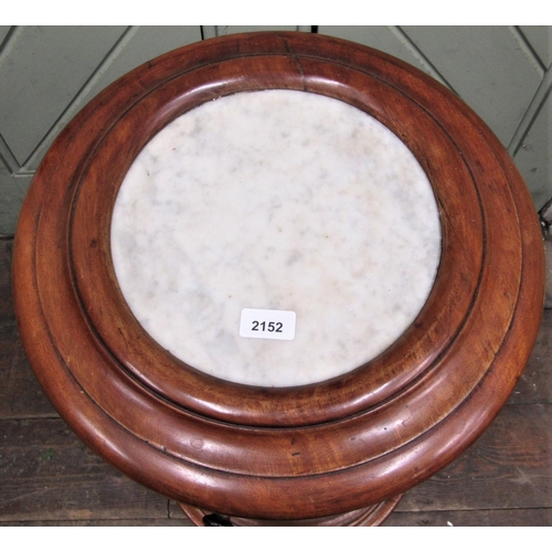 2152 - A Victorian mahogany cylindrical commode, the top inset with marble