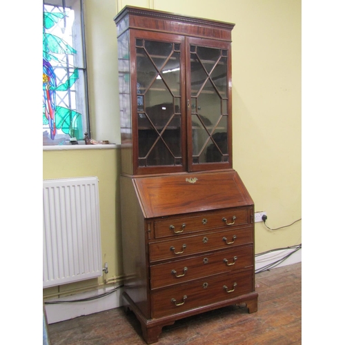 2156 - An Edwardian mahogany bureau bookcase, the bureau fitted with an arrangement of four long graduated ... 