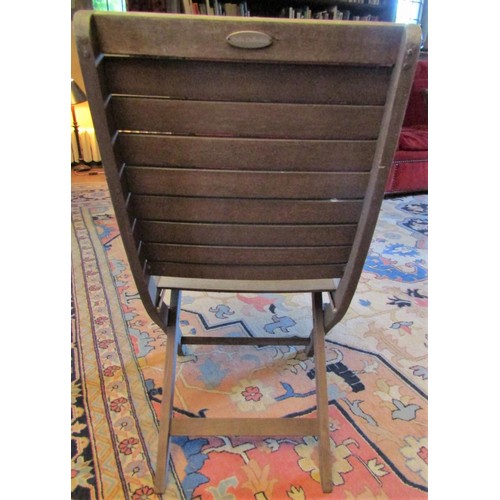 96 - A set of ten folding teak wood garden/event chairs from the Cuba Collection (the purchaser to have t... 