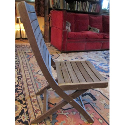 97 - A set of ten folding teak wood garden/event chairs from the Cuba Collection (the purchaser to have t... 