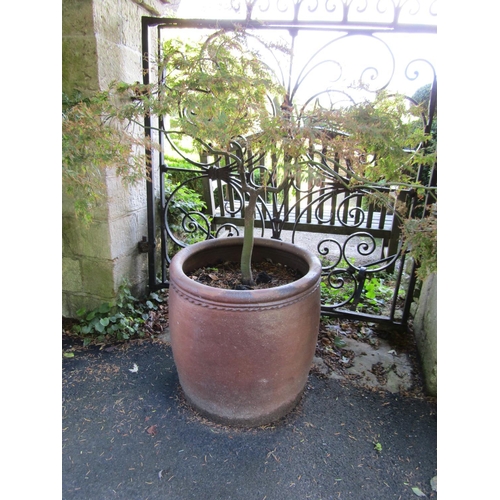 83 - A salt glazed barrel shaped planter with simple rope twist border, 55cm high x 55cm diameter