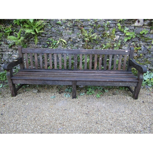 89 - A good quality teak garden bench, 240cm long approx