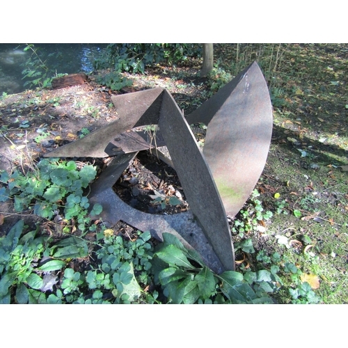 91 - An iron sculpture of angular construction, 120cm x 90cm x 63cm approx