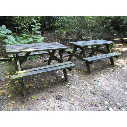 92 - Two weathered picnic tables