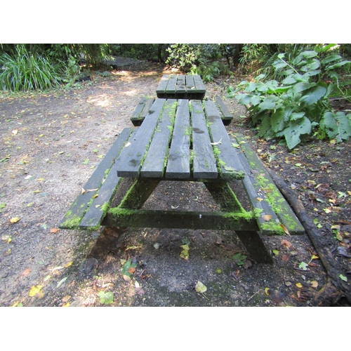 92 - Two weathered picnic tables