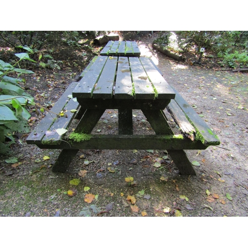 92 - Two weathered picnic tables