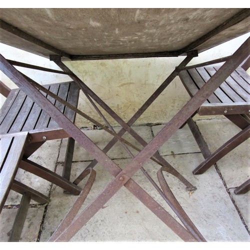 65a - A vintage style café table, the rectangular top zinc lined, 120cm x 80cm, raised on an ironwork base