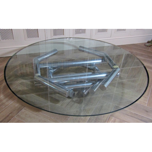 230 - Possibly Italian chrome glass top coffee table of circular form with thick heavy glass plate top, up... 