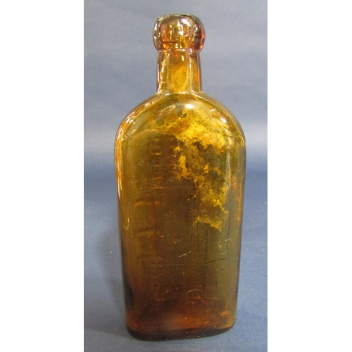 1133 - Warners Safe Cure of London brown glass bottle, 29 cm high, together with a further early glass bott... 