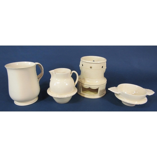 1080 - An early 19th century creamware three sectional veilleuse together with burner with moulded female c... 