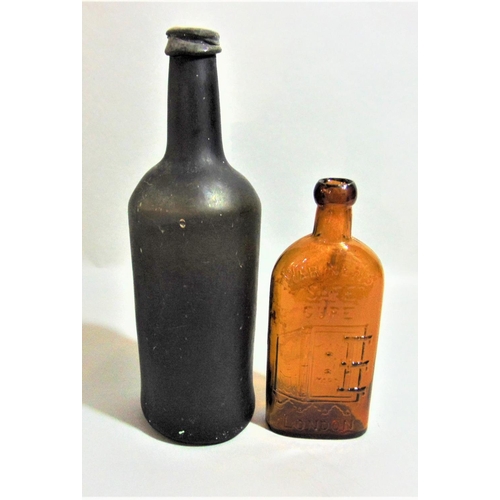 1133 - Warners Safe Cure of London brown glass bottle, 29 cm high, together with a further early glass bott... 