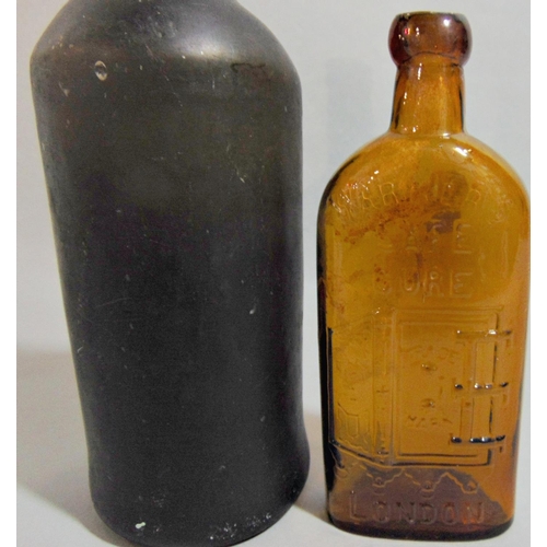 1133 - Warners Safe Cure of London brown glass bottle, 29 cm high, together with a further early glass bott... 